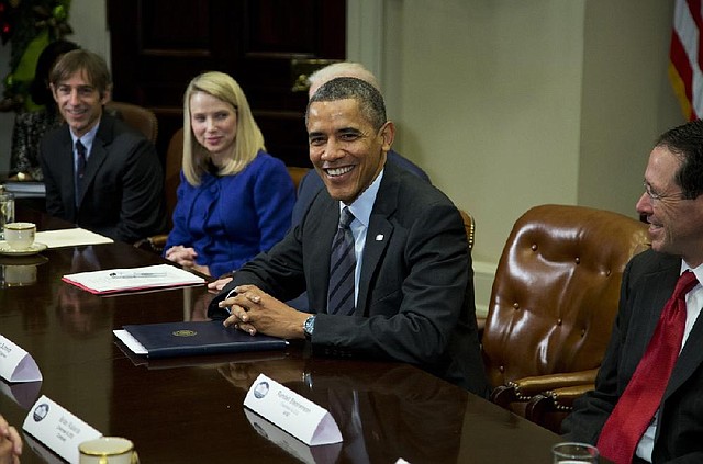 President Barack Obama meets Tuesday at the White House with Marissa Mayer of Yahoo and other technology executives. 