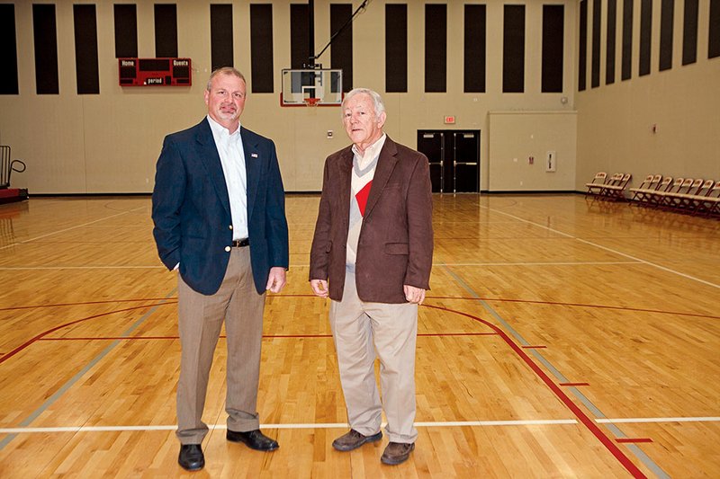 Faulkner County Judge Allen Dodson, left, and Vilonia School Superintendent Frank Mitchell are shown in the safe room utilized by Vilonia High School and Junior High. The room is also used for physical education. Dodson said he has been working behind the scenes with local, state and federal officials to find a way the county can help every school in the area get a safe room.