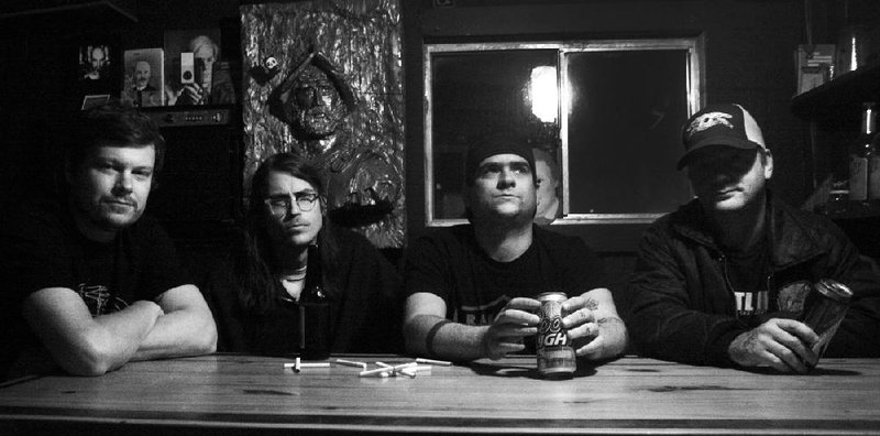 Smoke Up Johnny — Corey Bacon (from left), Alan Disaster, Jon Rice and Matt Floyd — return for a reunion show at the White Water Tavern on Saturday. 