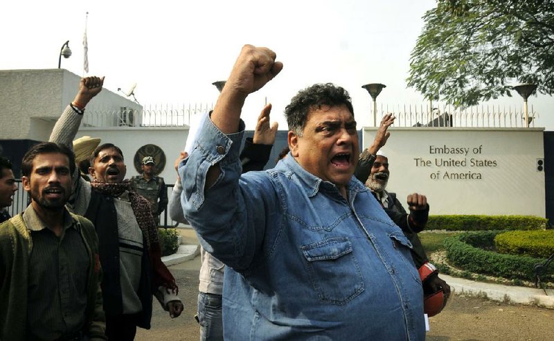 Protesters gather Wednesday outside the U.S. Embassy in New Delhi to express anger over the treatment of Khobragade in New York. 