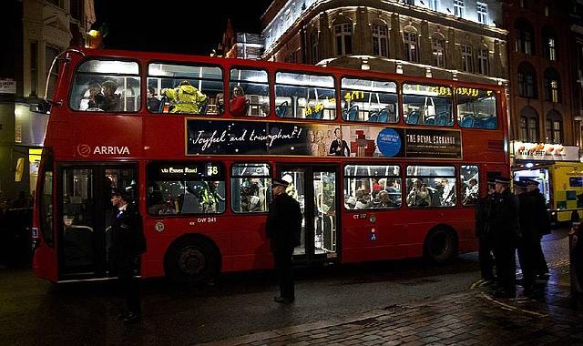 Shocked and injured theatergoers are transported to hospital in a commandeered London bus  following an incident  during a performance at the Apollo Theatre,  in London's Shaftesbury Avenue, Thursday evening, Dec. 19, 2013. It wasn't immediately clear which part of the building had collapsed. The London Fire Brigade said the theatre was almost full, with around 700 people watching the show. A spokesman said it was thought  between 20 and 40 people were injured. (AP Photo by Joel Ryan, Invision)