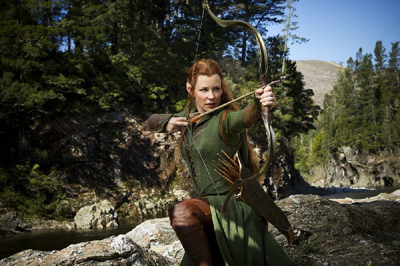 Caption: EVANGELINE LILLY as Tauriel in the fantasy adventure "THE HOBBIT: THE DESOLATION OF SMAUG," a production of New Line Cinema and Metro-Goldwyn-Mayer Pictures (MGM), released by Warner Bros. Pictures and MGM..