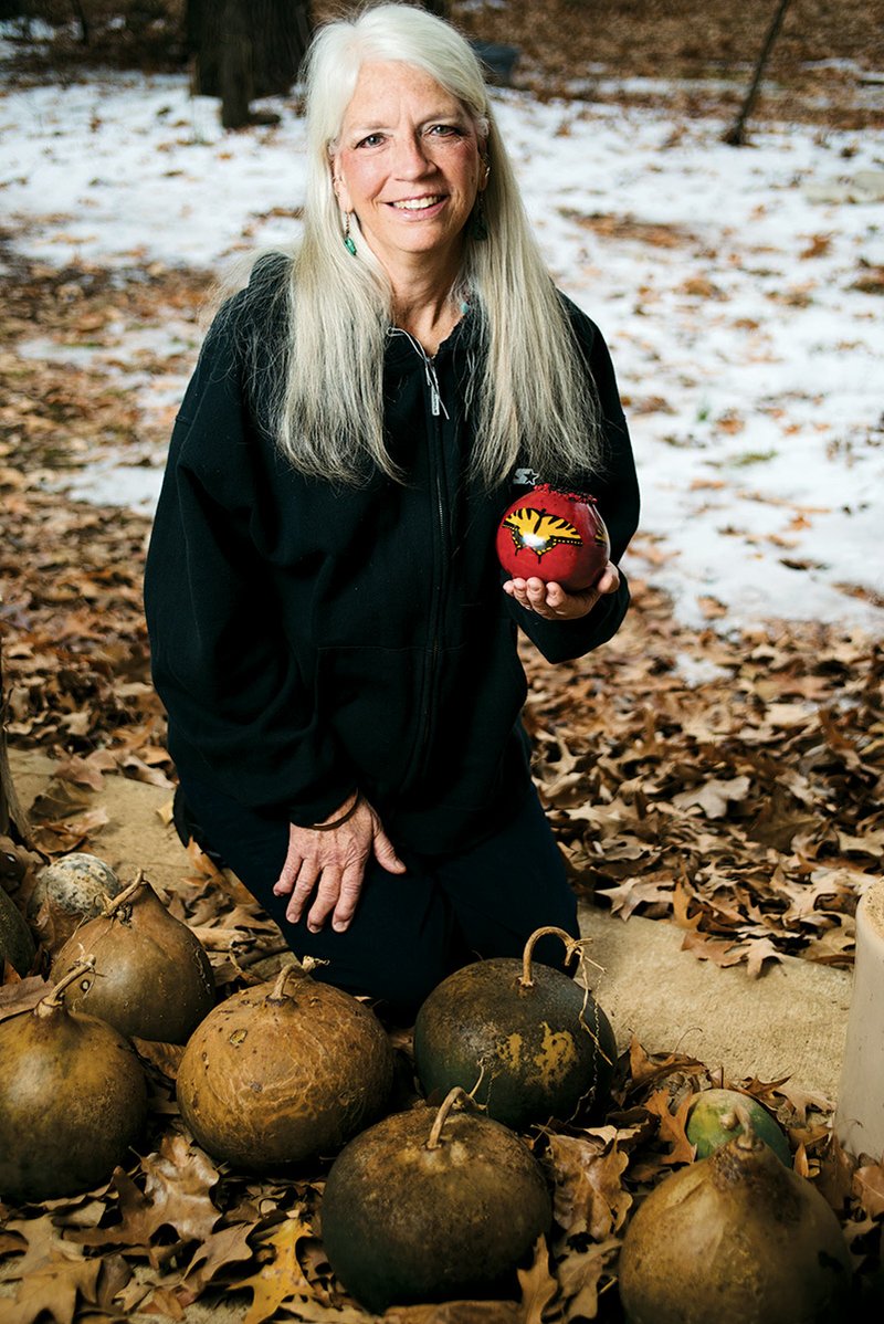 Sharon Clark of Cabot makes art out of gourds that she grows at her house.