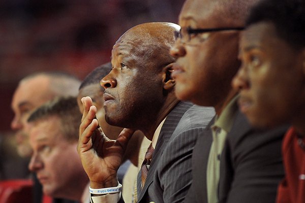 Arkansas coach Mike Anderson watches as his Razorbacks defeat UT Martin during the second half of the basketball game in Bud Walton Arena in Fayetteville on Thursday December 19, 2013.