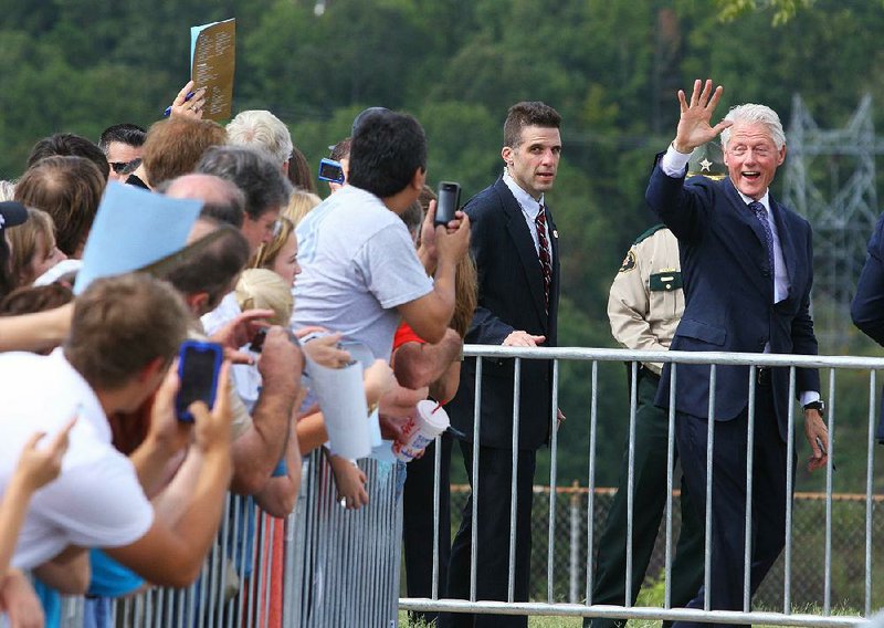 10/3/13
Arkansas Democrat-Gazette/STEPHEN B. THORNTON
Former President Bill Clinton waves goodbye to a crowd following a celebration of the 50th Anniversary of the Greers Ferry Dam dedication Thursday in Heber Springs.