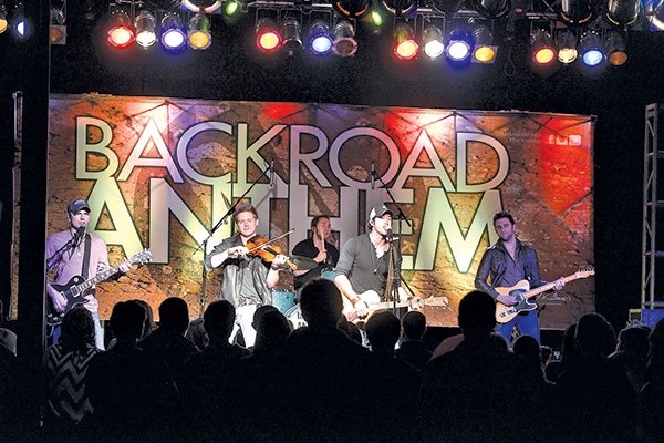 STAFF PHOTO ANTHONY REYES 
Despite ice and cold, many still showed up to see country/rock band Backroad Anthem perform Dec. 12 at George’s Majestic Lounge in Fayetteville.
