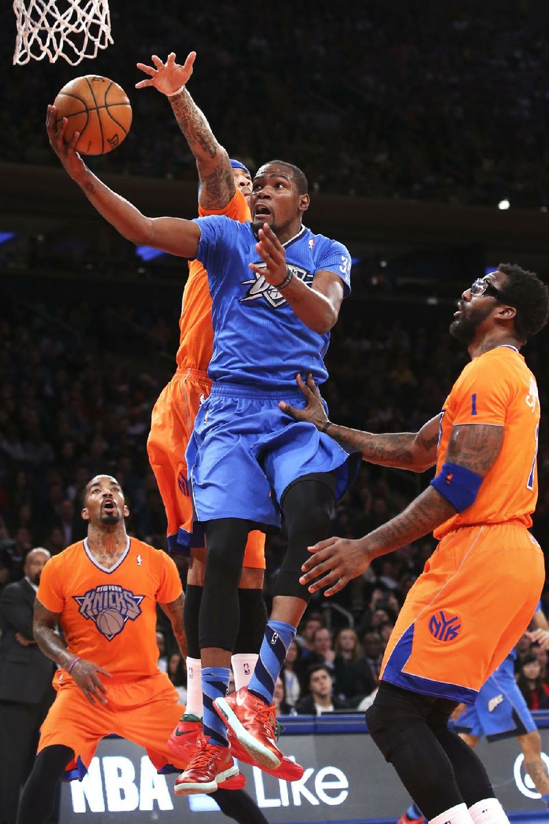 Oklahoma City forward Kevin Durant goes up for two of his gamehigh 29 points in a 123-94 victory over the New York Knicks in Madison Square Garden in New York on Wednesday. 