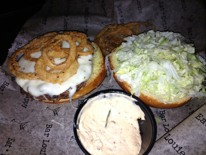 Burgers start at $1 and can be customized with additional toppings (at additional charges) at Bar Louie on Tuesday nights. 