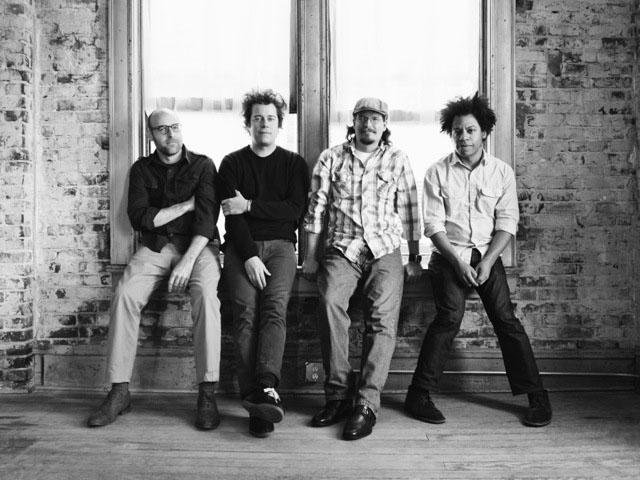 The Big Cats — Burt Taggart (from left), Jason White, Josh Bentley and Colin Brooks — celebrate 20 years as a band with a pair of shows Friday at White Water Tavern. 