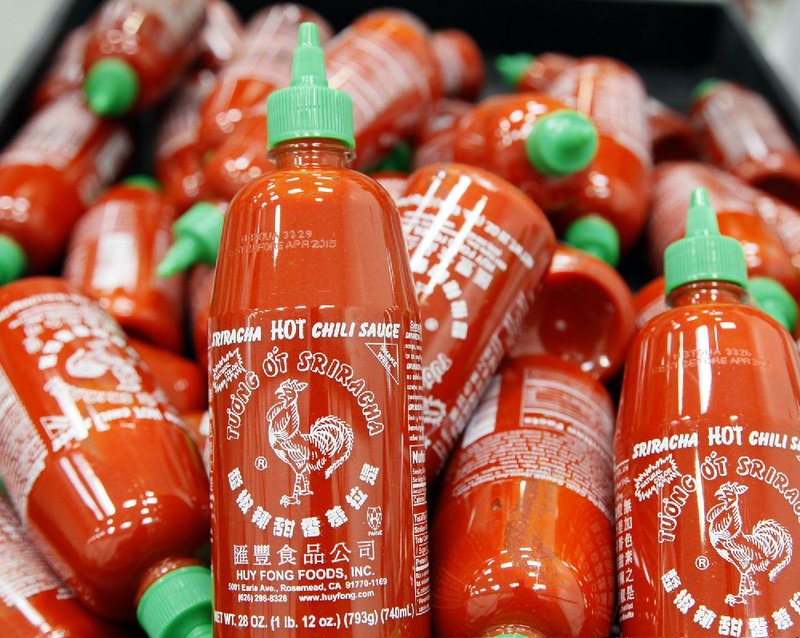 Heat fiends ended the year angsting over the future of Sriracha, the trendy hot sauce with the rooster on the bottle. A court ordered Irwindale, Calif.-based Huy Fong Foods to halt production of the sauce until the odors could be brought under control after people living nearby complained the fumes burned their eyes. 