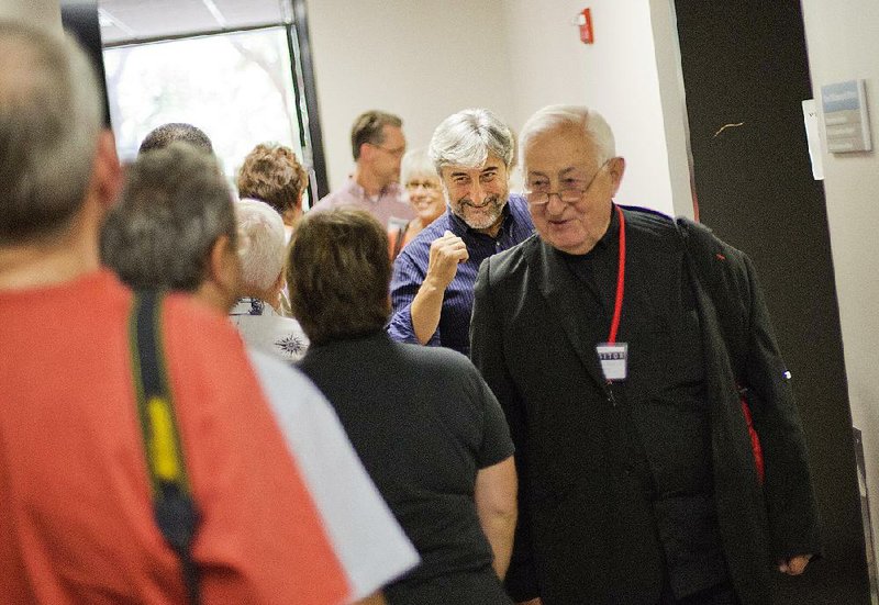 Airport chaplains Michael Selinotakis (second from right) and Antonin Blanchi (right), both of Nice Cote d’Azur Airport in France, greet fellow chaplains attending the International Association of Civil Aviation Chaplains’ annual conference at Delta Air Lines’ headquarters in Atlanta. 