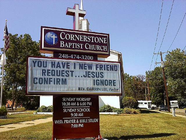 In this Sept. 2010 photo, the sign outside Cornerstone Baptist Church displays its message to drivers in Farmington Hills, Mich. Darrin Lee credits the slogans on his sign for helping his flock grow to more than 100.