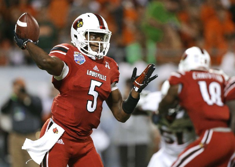 Louisville quarterback Teddy Bridgewater was 35 of 45 passing for 447 yards and 3 touchdowns to lead the No. 18 Cardinals to a 36-9 victory over the Miami Hurricanes on Saturday at the Russell Athletic Bowl in Orlando, Fla. Bridgewater, who also had a rushing touchdown, was named the game’s most valuable player. 