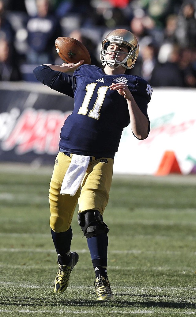 Tommy Rees (above) passed for 319 yards in his final college game, Kyle Brindza kicked five field goals and Notre Dame muddled through a 29-16 victory against Rutgers in the Pinstripe Bowl at Yankee Stadium in New York on Saturday.