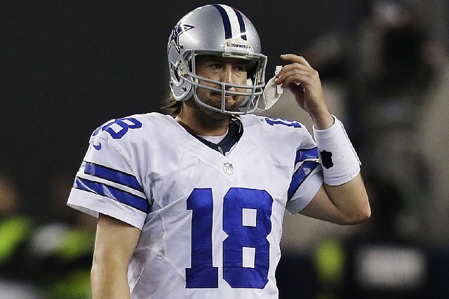 Dallas Cowboys quarterback Kyle Orton (18) leaves the field after throwing an interception to Philadelphia Eagles cornerback Brandon Boykin (22) during the second half of an NFL football game, Sunday, Dec. 29, 2013, in Arlington, Texas. The Eagles won 24-22. (AP Photo/Tim Sharp)