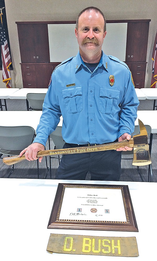 STAFF PHOTO MELISSA GUTE 
Delton Bush, who recently retired as a captain with the Bentonville Fire Department, will become Centerton’s first full-time fire chief Wednesday. Bentonville Fire Department held a retirement party Monday to celebrate Delton Bush’s 18 years of service.