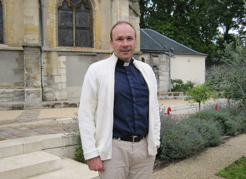 This July 2011 handout photo provided by the City Hall of Sceaux, north of Paris, shows French priest Georges Vandenbeusch, who was kidnapped in Cameroon in mid-November but has reportedly been set free. 
