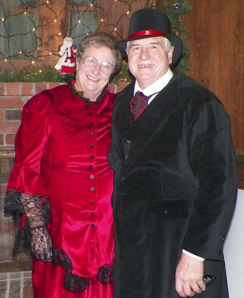 Sulphur Springs commissioner June Murray and Larry Burge dressed in 1890s costumes Dec. 7 during the annual progressive dinnner in Sulphur Springs.