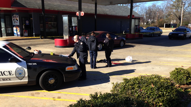 Police investigate a Friday afternoon shooting at the SuperStop at Roosevelt Road and Johnson Street in Little Rock.