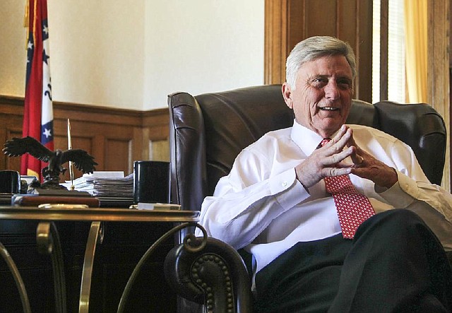 Gov. Mike Beebe reminisces about his 30-plus years in Arkansas politics from his office at the state Capitol. He said he will not seek another elected office after his term expires. 