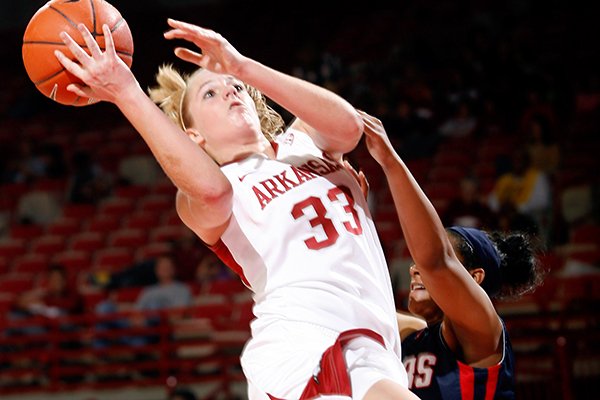 Melissa Wolff scored 14 points and recorded 12 rebounds in her first start at Missouri on Sunday. The Razorbacks won 69-66.