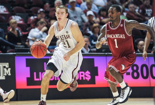 Texas A&M guard Alex Caruso drives past Arkansas defender Mardracus Wade at Reed Arena on Jan. 9, 2013. The Aggies defeated the Razorbacks 69-51 in the conference opener last year.