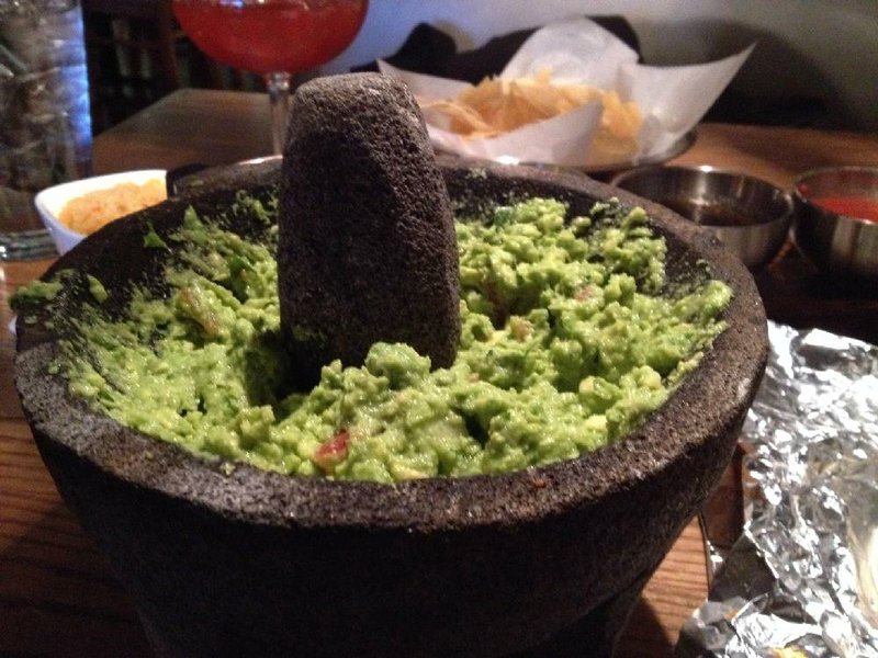 Ponchitos’ Guacamole isn’t made at table-side, but it is made to order with a stone mortar and pestle. 
