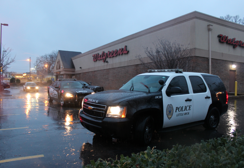 Police work the scene of a reported robbery at a Little Rock Walgreens Thursday morning