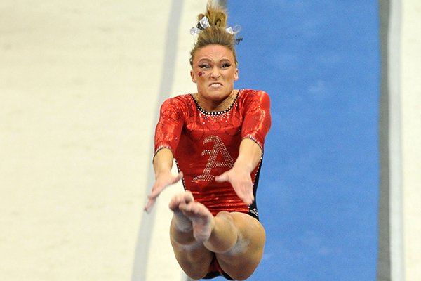 University of Arkansas gymnast Katherine Grable makes her vault attempt during Friday night's gymnastics meet at Barnhill Arena in Fayetteville.