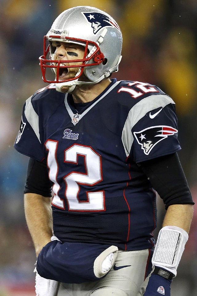 New England Patriots quarterback Tom Brady (12) yells during the second half of an AFC divisional NFL playoff football game against the Indianapolis Colts in Foxborough, Mass., Saturday, Jan. 11, 2014. (AP Photo/Michael Dwyer)