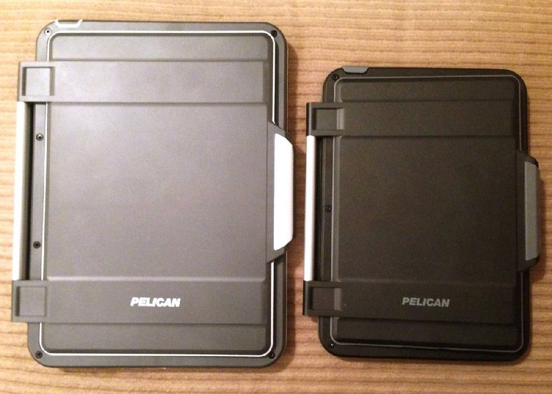 Special to the Arkansas Democrat-Gazette - 01/10/2014 - The Pelican Vault Series cases for iPad Air (left) and iPad Mini offer rugged protection, but it may take time to get the tablets into the cases. 