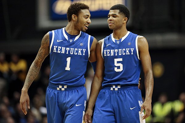 Kentucky's James Young (1) and Andrew Harrison (5) talk in the final minutes of an NCAA college basketball game against Vanderbilt on Saturday, Jan. 11, 2014, in Nashville, Tenn. Kentucky won 71-62. (AP Photo/Mark Humphrey)