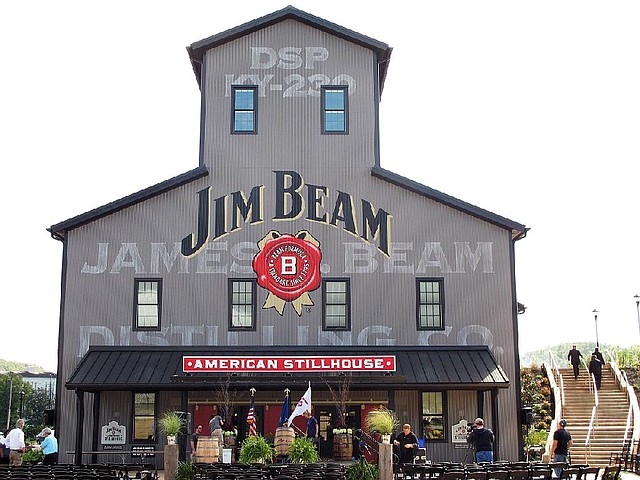 FILE - This Oct. 3, 2012, file photo, shows the Jim Beam visitors center at its central distillery in Clermont, Ky. Beam, the maker of Jim Beam and Maker's Mark alcohol brands, has agreed to be acquired by Japan's Suntory Holdings Ltd. for approximately $13.62 billion. (AP Photo/Bruce Schreiner, File)