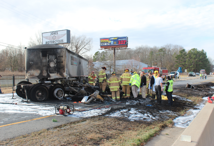 Crews work a truck fire on Interstate 30 Tuesday morning.
