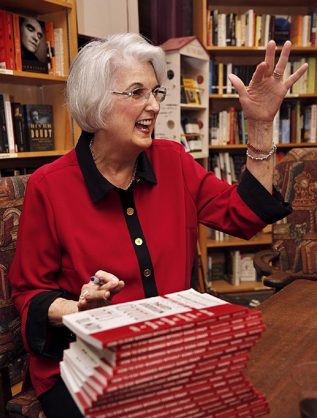 Rebecca Ward, Little Rock marriage and family therapist, prepares to sign copies of the newly updated edition of her 2000 book, How to Stay Married Without Going Crazy, during a Dec. 5 event at WordsWorth Books & Co. in Little Rock. 