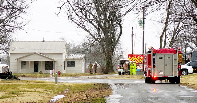 Photo by Randy Moll Firefighters from Highfill, Gentry, Centerton and Cave Springs responded to a fire at this home along Fourth Street in Highfill on Friday morning. The fire is believed to have been caused by lightning.