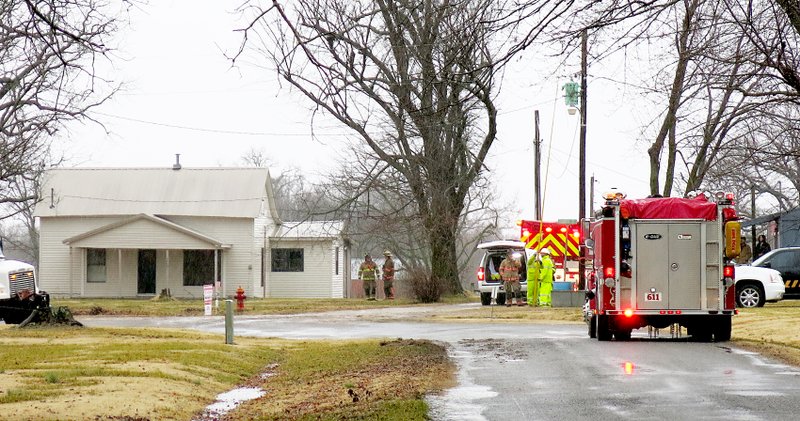 Photo by Randy Moll Firefighters from Highfill, Gentry, Centerton and Cave Springs responded to a fire at this home along Fourth Street in Highfill on Friday morning. The fire is believed to have been caused by lightning.