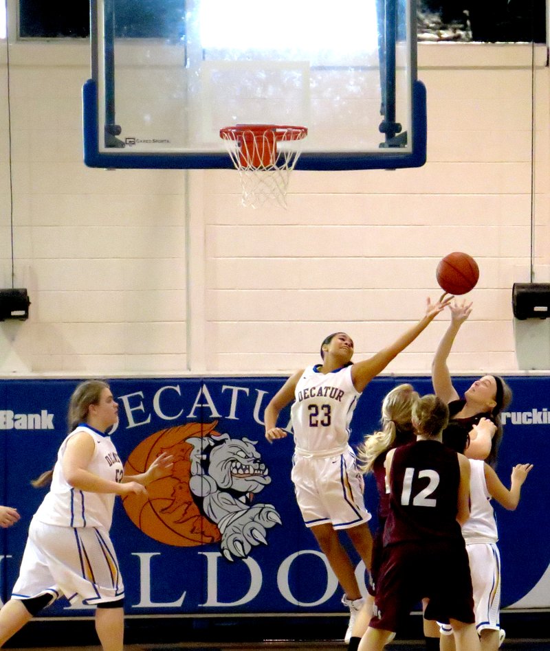 Photo by Mike Eckels Decatur point guard Sarah Harris strips the ball away from a Hartford player during the senior high game in Decatur on Jan. 11. Harris leadership helped give the Lady Bulldogs their first victory of the season, 54 to 20.