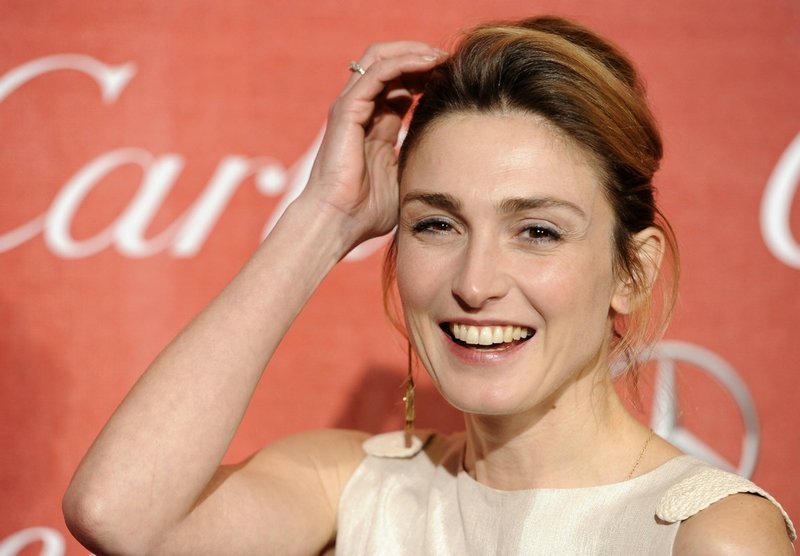 In this Jan.7, 2012 file photo, French actress Julie Gayet poses at the 2012 Palm Springs International Film Festival Awards Gala, in Palm Springs, Calif.  
