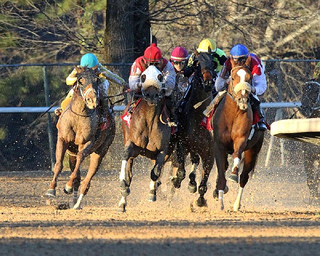 Drogue and jockey Calvin Borel (right) break into the lead on their way to winning last Saturday’s Fifth Season Stakes at Oaklawn Park in Hot Springs. 