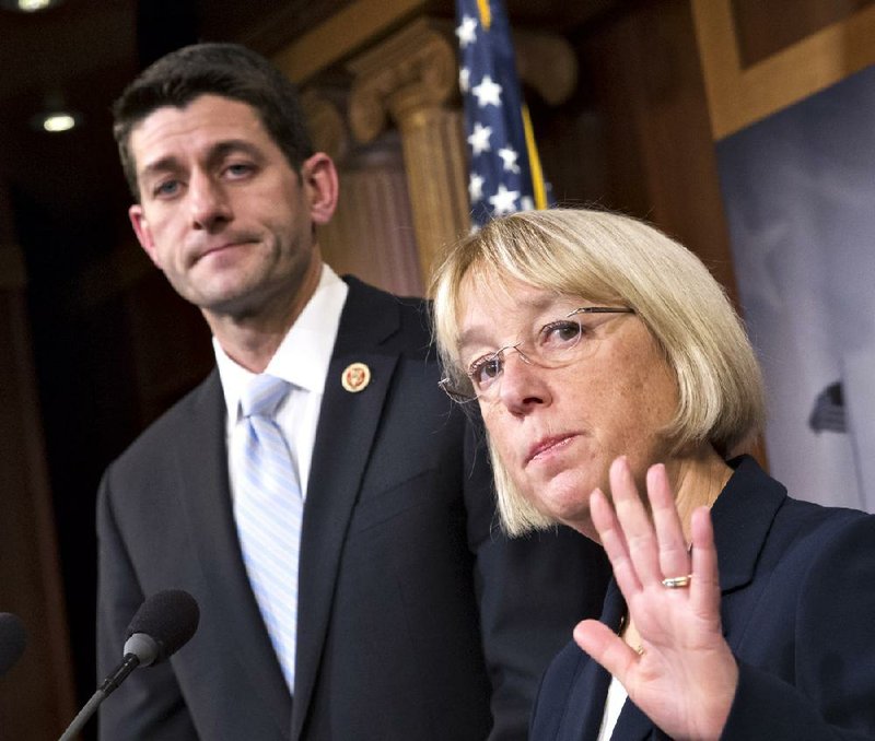 The House bipartisan spending bill passed Wednesday fills out the budget agreement forged by Rep. Paul Ryan, R-Wis., and Sen. Patty Murray, D-Wash., shown Dec. 10 when they first announced the agreement. 