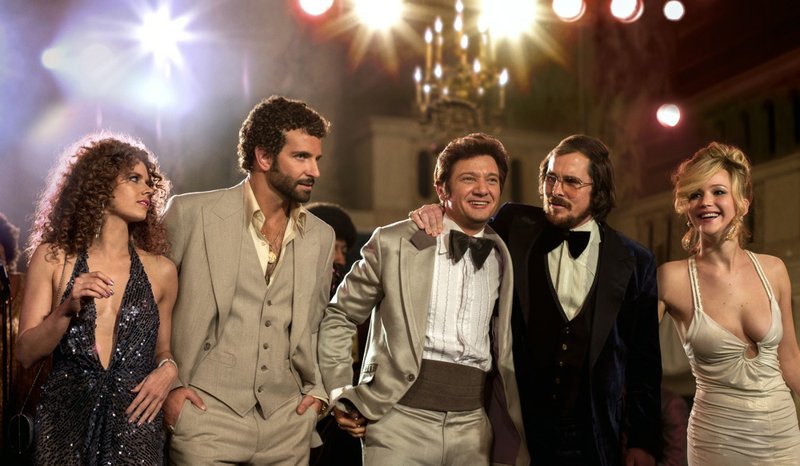 This film image released by Sony Pictures shows, from left, Amy Adams, Bradley Cooper, Jeremy Renner, Christian Bale and Jennifer Lawrence in a scene from "American Hustle." The film was nominated for an Academy Award for best picture on Thursday, Jan. 16, 2014. The 86th Academy Awards will be held on March 2. 