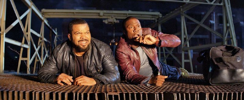 James (Ice Cube) is a crusty police detective looking to scare security guard Ben (Kevin Hart) away from his sister in Ride Along.