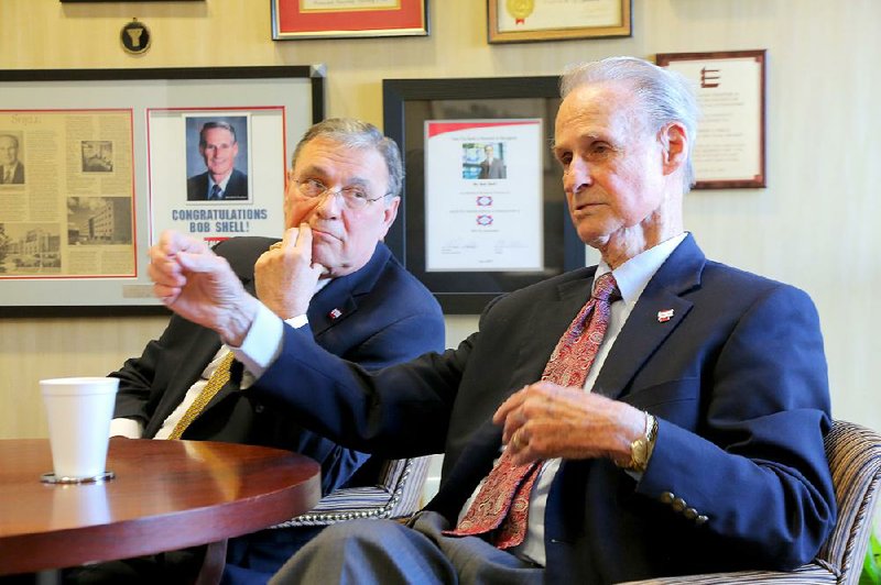 1/13/14
Arkansas Democrat-Gazette/STEPHEN B. THORNTON
John "Scott" Copas, left, listens as Bob Shell talks inside his office at Baldwin & Shell Construction Co. headquarters at Capitol Ave. and Chester Street in downtown Little Rock.