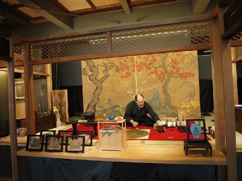 Artist Allan West works in his studio in the Yanaka neighborhood of Tokyo. Only nine stores remain in Japan that sell the traditional pigments West paints with, four of which are in Yanaka. 