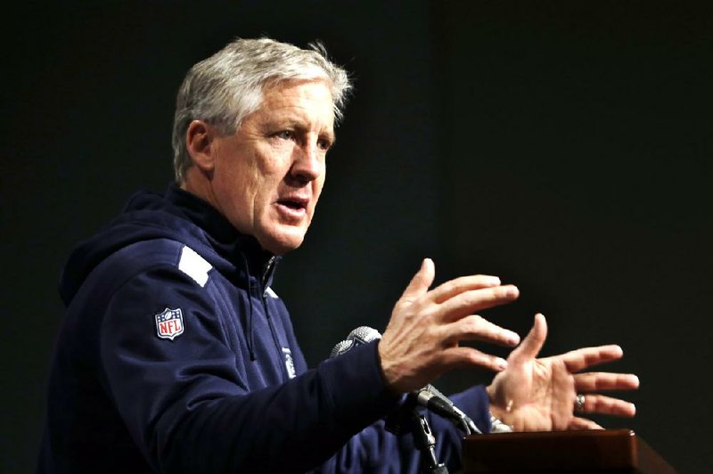 Seattle Coach Pete Carroll shies away from the intimidation label used by his defensive backs, preferring assertive. 