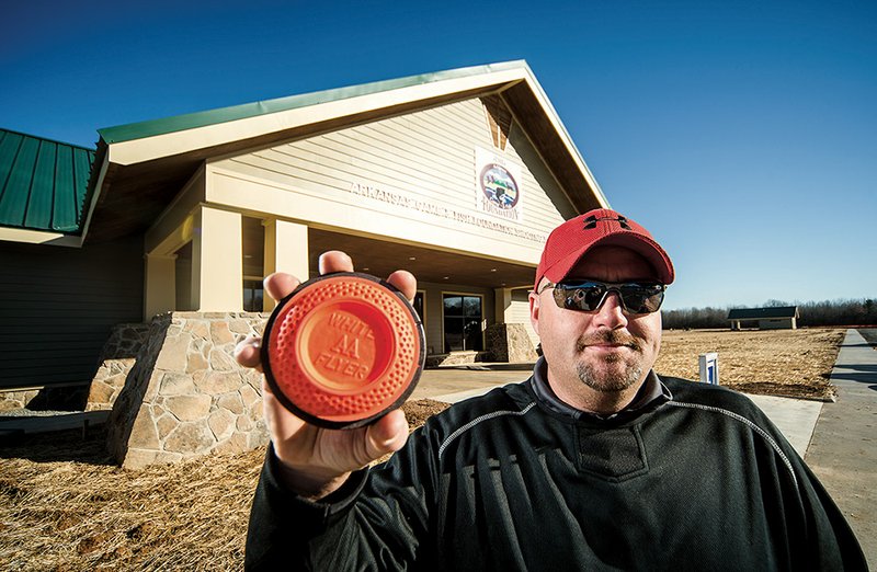 Kevin House, Jacksonville Parks and Recreation director, holds a clay pigeon in front of the new Arkansas Game and Fish Foundation Shooting Sports Complex.