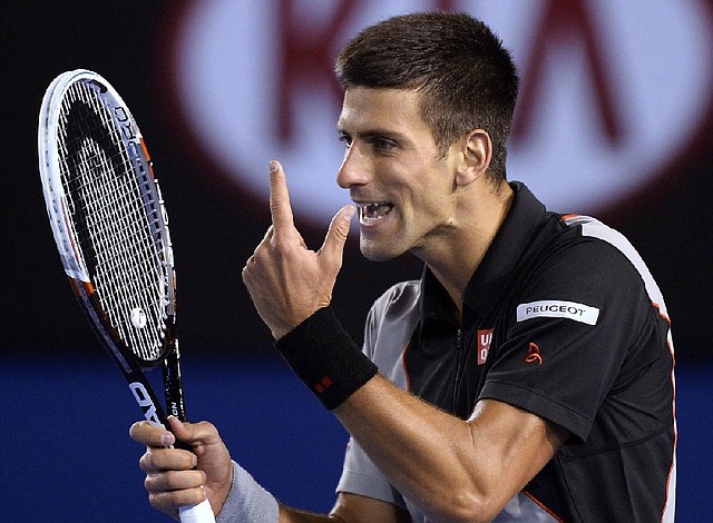 Novak Djokovic appeals a point during his quarterfinal match Tuesday against Stanislas Wawrinka. The top-seeded Djokovic lost in five sets to Wawrinka. 