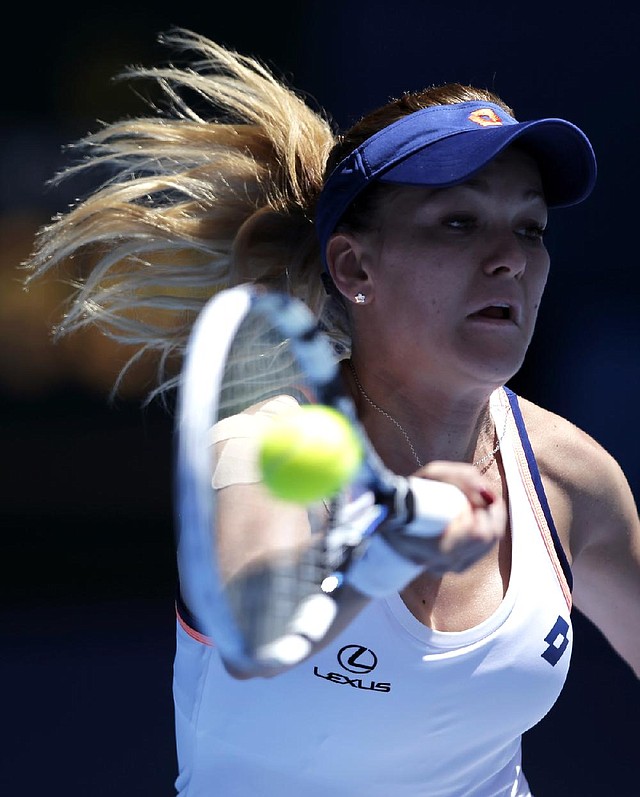 Agnieszka Radwanska upset Victoria Azarenka 6-1, 5-7, 6-0 in a women’s quarterfinal match at the Australian Open. 