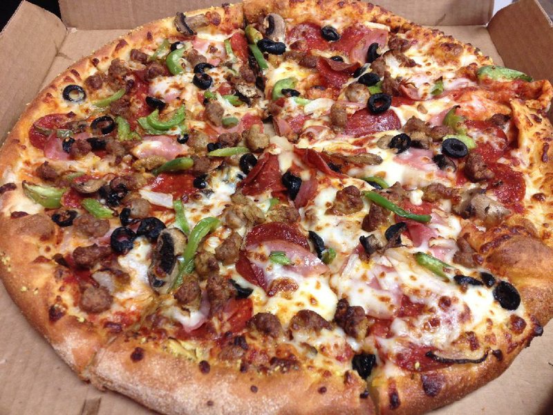 The ExtravaganZZa Feast at Domino’s Pizza in Benton features pepperoni, ham, Italian sausage, beef, onions, green peppers, mushrooms, black olives and cheese. 